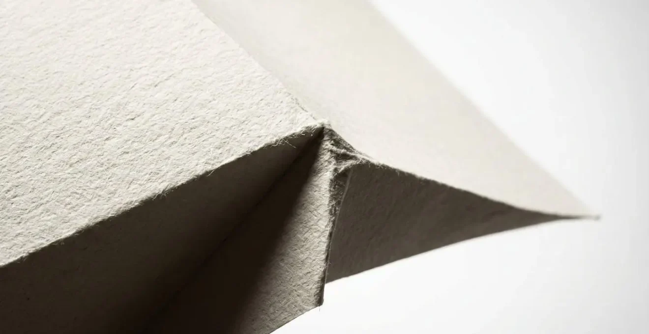 Démonstration visuelle d'une feuille A3 pliée créant 4 pages A4